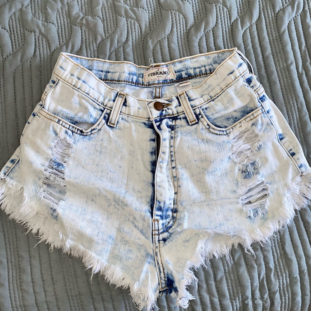White and blue distressed shorts